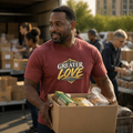 Man wearing Greater Love John 15:13 Christian T-shirt while volunteering